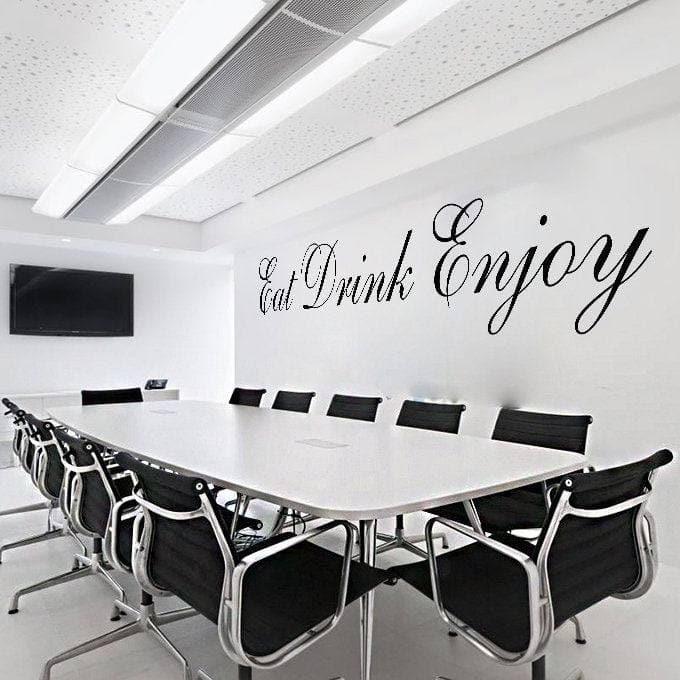 Elegant Eat Drink Enjoy wall decal in modern conference room with stylish furniture.