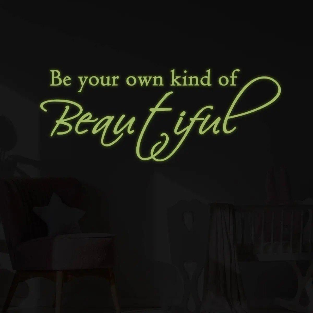 Glowing inspirational quote wall sticker saying 'Be your own kind of Beautiful' in luminous green font.