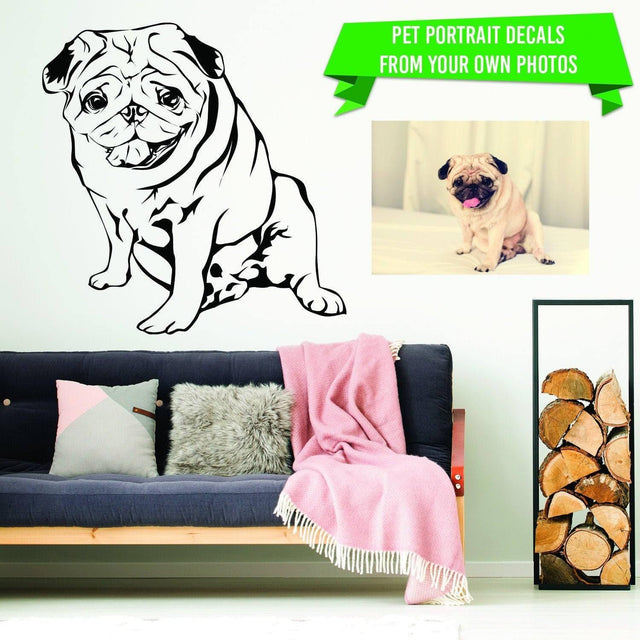 Custom pet portrait wall decal made from a dog photograph and displayed above a sofa in a living room.