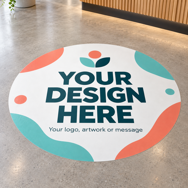 Example of a round custom floor decal with Your Design Here artwork on a reception floor