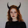 Model wearing small 3D-printed demon horns, showcasing a gothic aesthetic perfect for cosplay and Halloween.