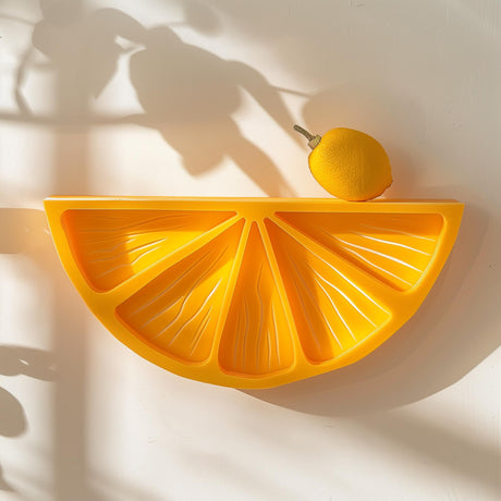 3D printed wall shelf shaped like a citrus slice, mounted on wall, modern fruit-inspired home decor accessory for kitchen or dining room