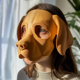 3D printed Beagle-inspired dog mask with soft minimal shape, worn by an adult model indoors, matte PLA plastic cosplay and costume accessory