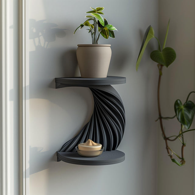 3D printed double-tier spiral wall shelf in matte dark PLA, with a twisting ribbed support between two round shelves, styled with small decor in a modern interior.