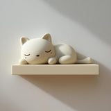 3D printed matte PLA wall shelf with an integrated sleeping cat figure lying on a small floating ledge against a light-colored wall.
