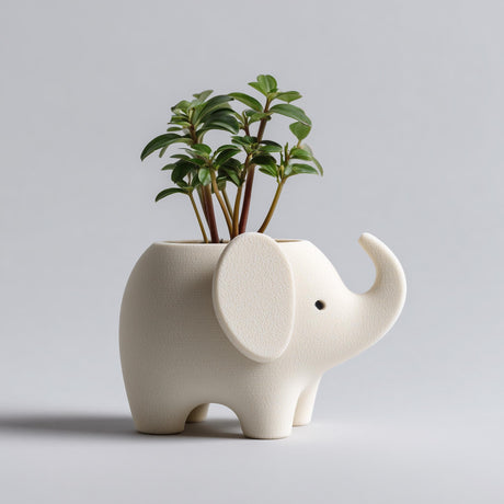 3D printed elephant-shaped planter with an open top used as a small pot, standing on a neutral background.
