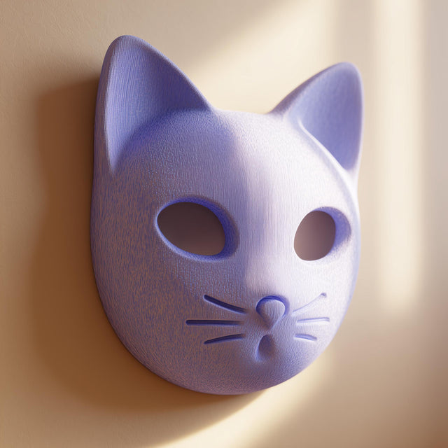 3D printed minimalist cat face wall decor with smooth rounded features and hollow eyes, mounted on a neutral wall in warm natural light.