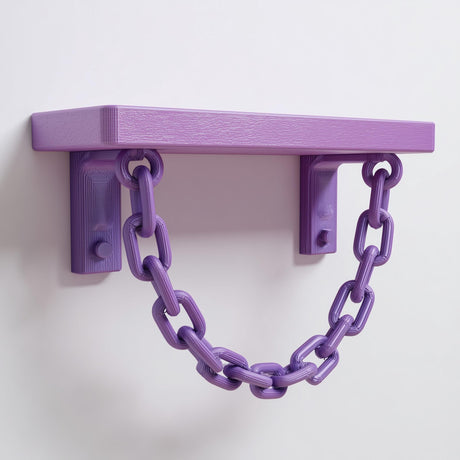 3D printed pastel purple wall shelf with two brackets and a decorative hanging chain, mounted on a clean white wall.