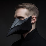 3D printed dark techno raven beak mask worn on an adult model, featuring sharp geometric planes and matte black futuristic design.