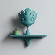 3D printed fantasy creature wall shelf with rounded character form and integrated ledge
