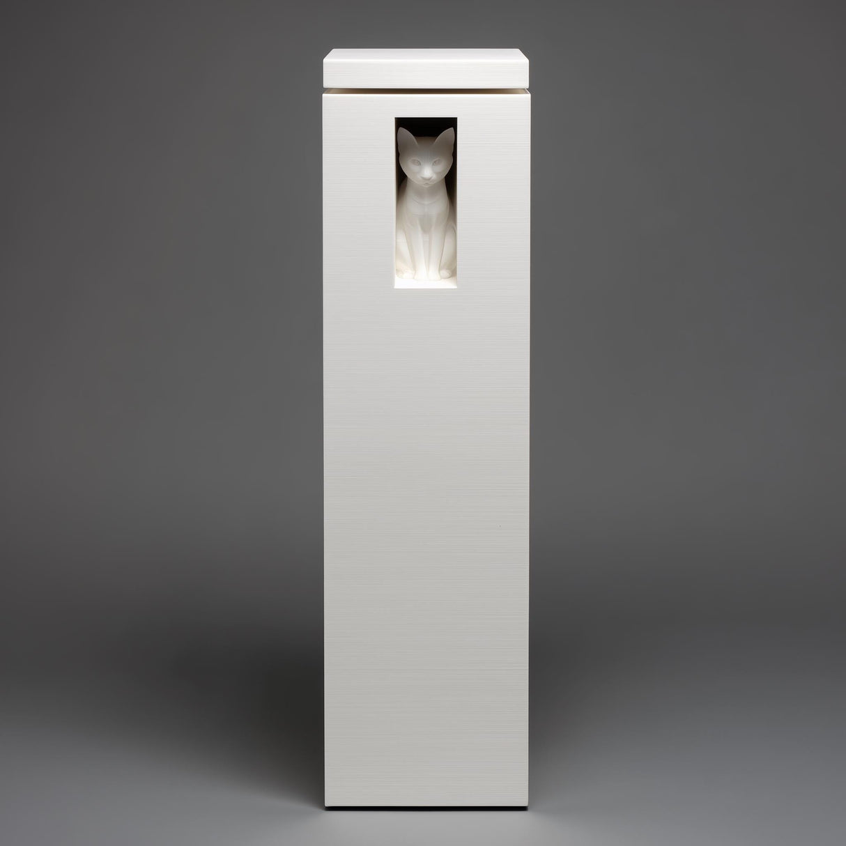 Tall white 3D printed minimalist pet ashes urn with a small cat figurine displayed inside a recessed window, studio grey background, clean modern design.