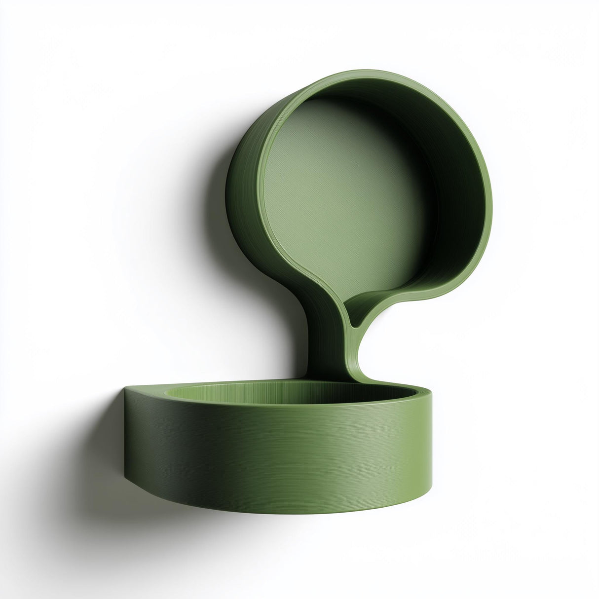 3D printed wall mounted organic bubble shelf with a rounded circular backplate and a small floating ledge tray, matte green finish, visible print texture.