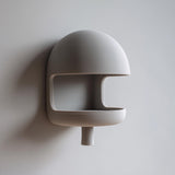 3D printed mushroom-inspired wall mounted shelf with a domed split canopy and open display niche, integrated shallow ledge, styled on a wall with minimal decor.