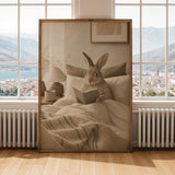 Californian Rabbit Reading in Bed Poster | Modern Gouache Bunny Wall Art | Warm Beige Oat Milk Decor | Cozy Scandinavian Bedroom Print