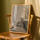 Californian Rabbit Reading in Bed Poster | Japanese Zen Sumi-e Bunny Wall Art | Warm Ivory Fog Gray Decor | Minimalist Bedroom Print