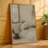 Dwarf Hotot Rabbit Reading in Bed Poster | Japanese Zen Sumi-e Bunny Wall Art | Warm Ivory Fog Gray Decor | Minimalist Bedroom Print