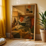 British Shorthair Reading in Armchair Poster | Retro Modern Cat Wall Art | Yellow Burnt Orange Decor | Cozy Mid Century Living Room Print