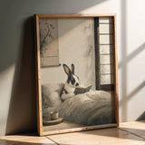 Harlequin Rabbit Reading in Bed Poster | Japanese Zen Sumi-e Bunny Wall Art | Warm Ivory Fog Gray Decor | Minimalist Bedroom Print