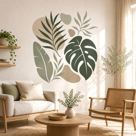 Abstract tropical botanical design on a white background with a large dark green monstera leaf, a sage banana-style leaf, slender leafy branches, and soft beige and tan organic shapes.