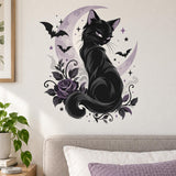 Black cat with purple eyes against a lavender crescent moon, framed by bats, stars, curling vines and a purple rose.