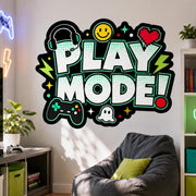 Colorful PLAY MODE gaming wall decal with a controller and pixel heart, displayed above a grey beanbag chair.