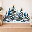 Watercolor-style snowy evergreen forest with red ornaments, berries, gold-colored stars, illustrated lights and dark rocks.