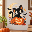 Wide-eyed black cat perched on a smiling orange pumpkin, with a pale crescent moon, small bats, rust leaves and vines.