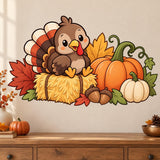 Smiling brown turkey on a golden straw bale, surrounded by orange pumpkins, acorns, green vines and fall leaves.
