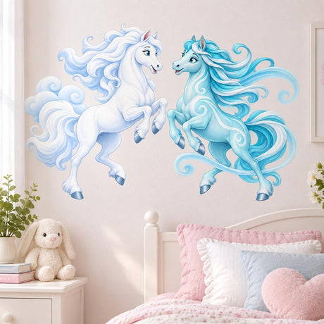 White and aqua unicorns rearing toward each other, with flowing blue and turquoise manes and pale decorative swirls.