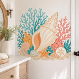 Underwater coastal wall sticker featuring a large spiral seashell, smaller shells and bright sea coral.