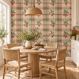 Burgundy and purple watercolor radishes with green leaves on cream wallpaper with a fine gray plaid grid.