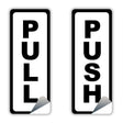 Adhesive doorway directional signage kit showing 'PULL' and 'PUSH' signs for easy navigation.