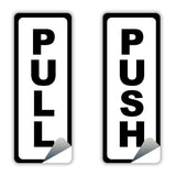 Adhesive doorway directional signage kit showing 'PULL' and 'PUSH' signs for easy navigation.