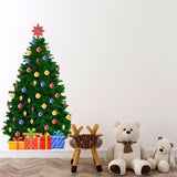Large Christmas Pine Wall Decal with colorful ornaments and gifts, adding festive cheer to a cozy living space.