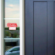 Emergency cling sticker on a window indicating pets are inside the home.