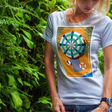 Model showcasing a custom photo print t-shirt with a colorful design against lush greenery.