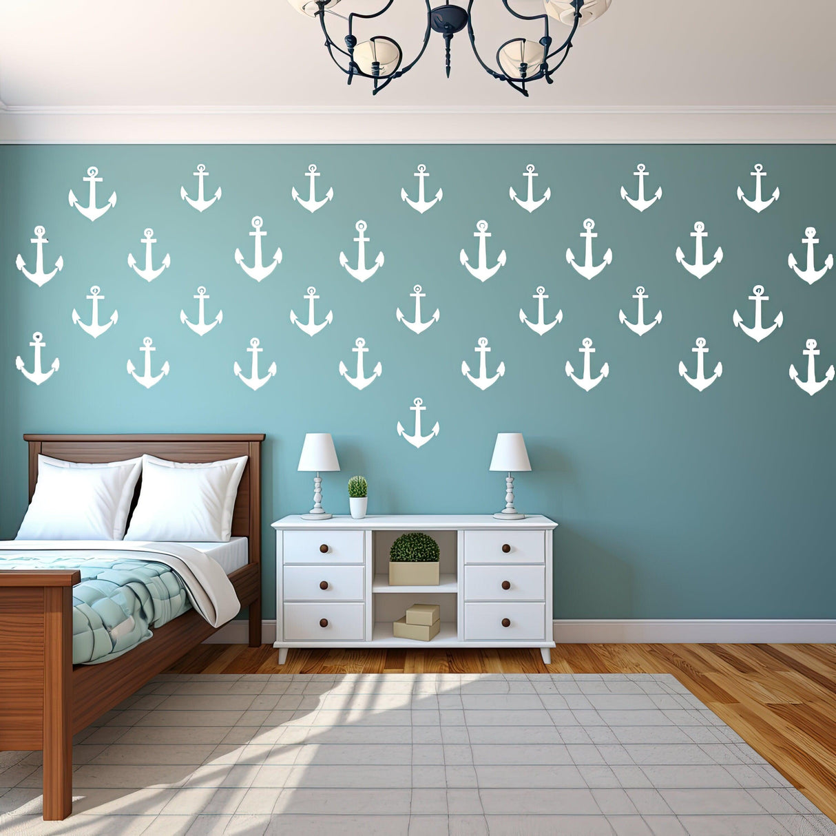 Vintage anchor vinyl wall decals in a nautical-themed bedroom with turquoise walls and white furniture.